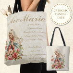 Katholieke Maagd Maria Rode Rozen Bloemen Ave Mari Tote Bag<br><div class="desc">Dit is een prachtig op maat ontworpen traditioneel katholiek afbeelding van de Heilige Maagd Maria met  rozen en de Heil Maria (AVE MARIA) in het Latijn. De achtergrond is een wit kantontwerp. De achterkant van het tas heeft een groter afbeelding van de Gezegende Moeder.</div>