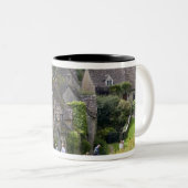 Katoesteenkool in het dorp tweekleurige koffiemok (Voorkant rechts)