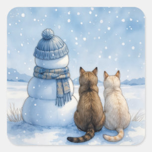 Katten die zitten met een sneeuwman in een veld vierkante sticker
