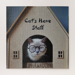 Katten hebben een personeelsbestand met een grappi legpuzzel