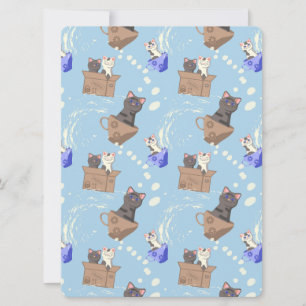 Katten in doos en melkdruppels op blauw