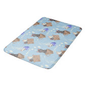 Katten in doos en melkdruppels op blauw badmat (Gekanteld)