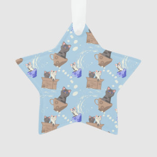Katten in doos en melkdruppels op blauw ornament