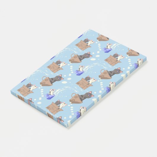 Katten in doos en melkdruppels op blauw post-it® notes (Schuin)