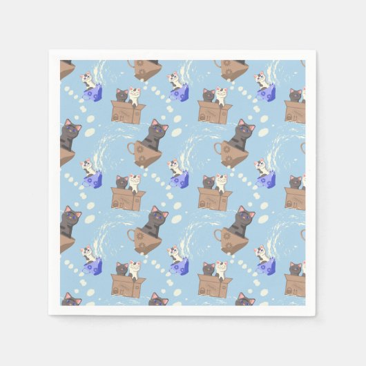 Katten in doos en melkdruppels op blauw servet (Voorkant)