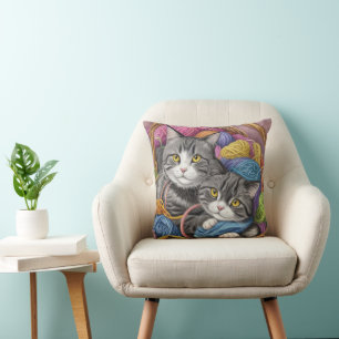 Katten in een mand kussen