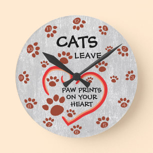 Katten laten pootafdrukken achter op je hart decor ronde klok