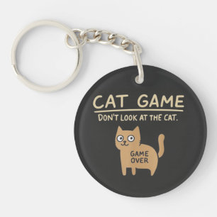 katten spel niet naar de kat kijken spel voorbij sleutelhanger