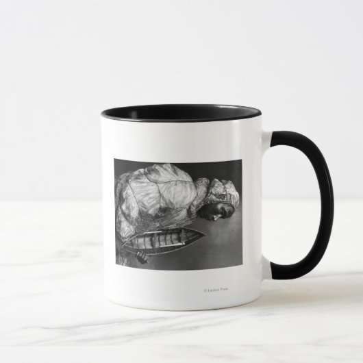 Kayaker met een waterdichte jas met een speelgoed- mok (Rechts)