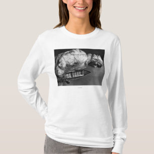 Kayaker met een waterdichte jas met een speelgoed- t-shirt