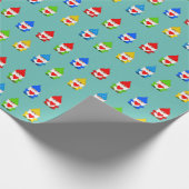 Keer multicolored gnomen op blauwgroen cadeaupapier (Hoek)