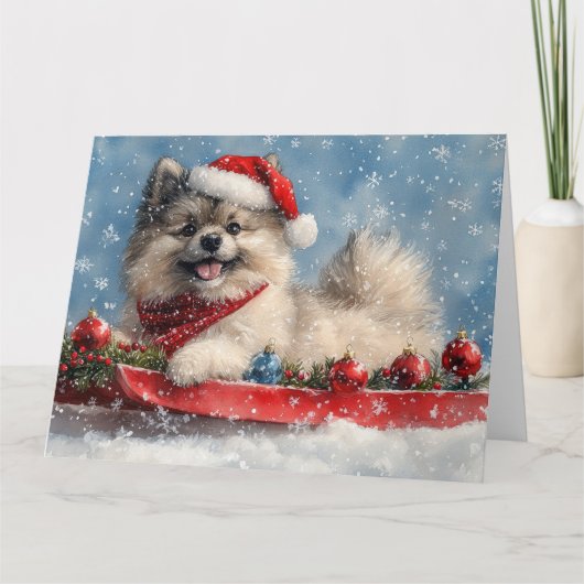 Keeshond Hond in Sledge Laat het Sneeuw Kerstmis Kaart (Voorkant)