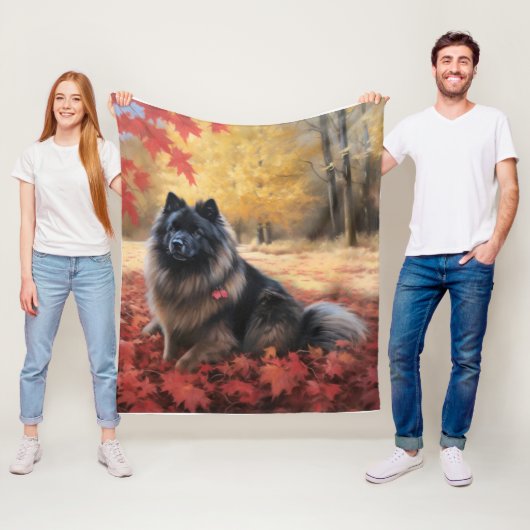 Keeshond in herfstbladeren val inspireert fleece deken (In situ)