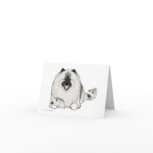 Keeshond met "puppy"