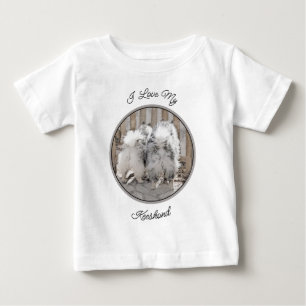 Keeshonds bij het schilderen van de poort - Oorspr