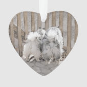 Keeshonds bij het schilderen van de poort - Oorspr Ornament (voorkant)