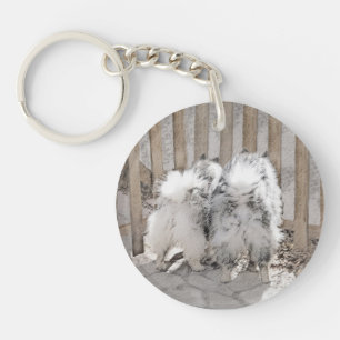 Keeshonds bij het schilderen van de poort - Oorspr Sleutelhanger