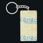 Kenzo Sleutelhanger<br><div class="desc">Kenzo. Show en draag deze populaire, mooie mannelijke voornaam die is ontworpen als kleurrijke tekstwolk gemaakt van horizontale en verticale krommende typografie van handletters in verschillende maten en schattige verse kleuren. Draag je positieve amerikaanse naam of show de wereld waar je van houdt of waar je van houdt. Merk met...</div>