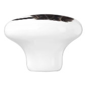 Keramische schedel met een zwarte kat knop (Zijkant)