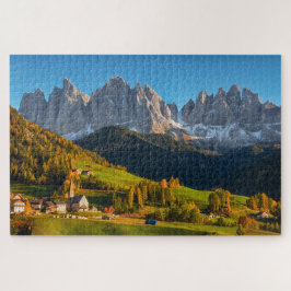 Kerk en dorp met berglandschap legpuzzel