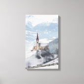 Kerk in een alpenwinterlandschap canvas afdruk (Voorkant)