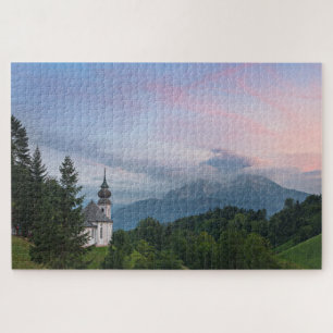 Kerk met Alpen-bergen bij zonsondergang Legpuzzel
