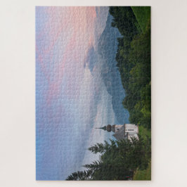 Kerk met Alpen-bergen bij zonsondergang Legpuzzel