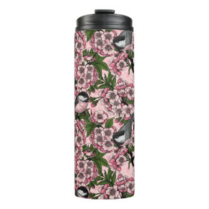 Kersenbloesem en kikkervisjes op roze thermosbeker