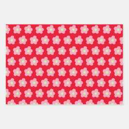 Kersenbloesems op rood inpakpapier vel