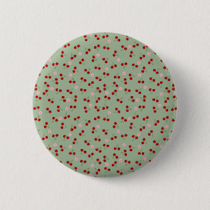 Kersenpatroon op groene achtergrond ronde button 5,7 cm