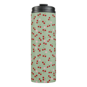 Kersenpatroon op groene achtergrond thermosbeker