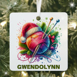 Kerst Breien Liefhebber Custom Name Metalen Ornament<br><div class="desc">Knit Some Holiday Cheer met een gepersonaliseerd breien Ornament! Vier uw liefde voor breien dit vakantieseizoen met dit charmante ornament ontworpen voor breiliefhebbers! Met een bolletje garen in een gezellige, handgebreide kerstmuts, met breinaalden, dennentakken en delicate sneeuwvlokken, brengt dit ornament warmte en creativiteit in je boom. Voeg een aangepaste naam...</div>