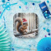 Kerst eekhoorn op besneeuwde boomtak papieren bordje (Feest)