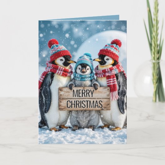 Kerst familie pinguïns met een houten teken kaart (Voorkant)