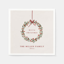 Kerst gebladerte krans met rode boog servet