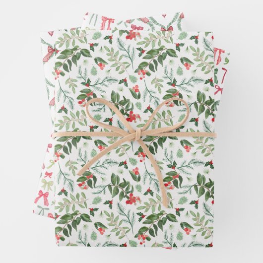 Kerst gebladerte latwerk en bogen in rood en groen inpakpapier vel (In situ)