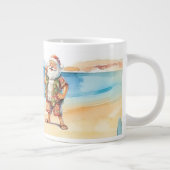 Kerst in juli met de kerstman op het strand grote koffiekop (Rechts)