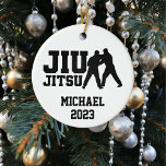 Kerst Jiu Jitsu gepersonaliseerd Keramisch Ornament<br><div class="desc">Dit ontwerp werd gecreeerd door digitale kunst. Het kan op het verstrekte gebied worden gepersonaliseerd of door de foto te veranderen of uw eigen woorden toe te voegen worden aangepast. Neem contact met me op colorflowcreations@gmail.com als je dit ontwerp op een ander product wilt gebruiken. Zie meer van mijn creaties...</div>