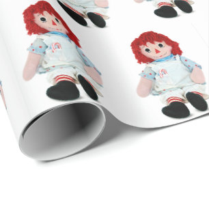 Kerst lappenpop met snoeprietje cadeaupapier