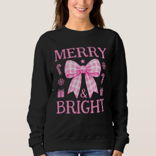Kerst met vrolijke en heldere roze geruite strik trui