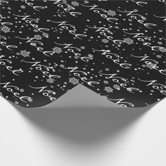 Kerst Noël tekst in sneeuwvlokken inpakpapier (Hoek)