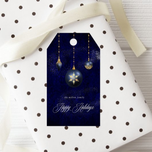 Kerst ornament met goud en marineblauw cadeaulabel