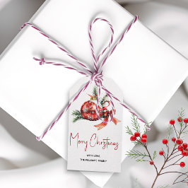 Kerst ornament met rode strik en spar takken cadeaulabel