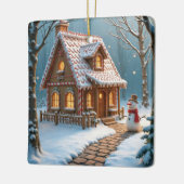 Kerst peperkoek huis met een sneeuwpop keramisch ornament (Links)