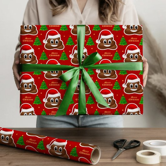 Kerst poep emoji met kerstmuts inpakpapier