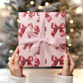 Kerst rode boog op roze achtergrond cadeaupapier
