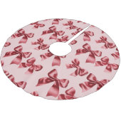 Kerst rode boog op roze achtergrond kerstboom rok (Gekanteld)