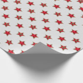 Kerst rode sterren op wit cadeaupapier (Hoek)