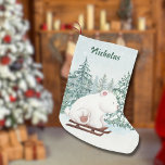 Kerst Schattige Polar Beer op Sleigh in Forest Sno Kleine Kerstsok<br><div class="desc">Gepersonaliseerde Polar Beer Christmas Joy! – Voeg een vleugje eigenzinnigheid toe aan je schoorsteenmantel met deze "Winter ONEderland" kous! Een schattig polair beer loopt door een besneeuwd bos en brengt feestelijk gejuich naar elke ruimte. Voeg eenvoudig een naam toe aan de banner bovenaan voor een aangepaste look die elke kerstochtend...</div>