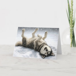 Kerst Siberische Husky maakt een sneeuwengel Feestdagen Kaart